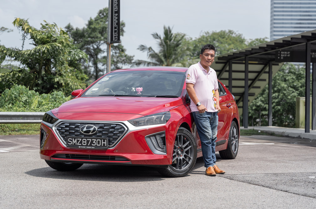 Mr Joshua Mok with his Hyundai IONIQ Hybrid