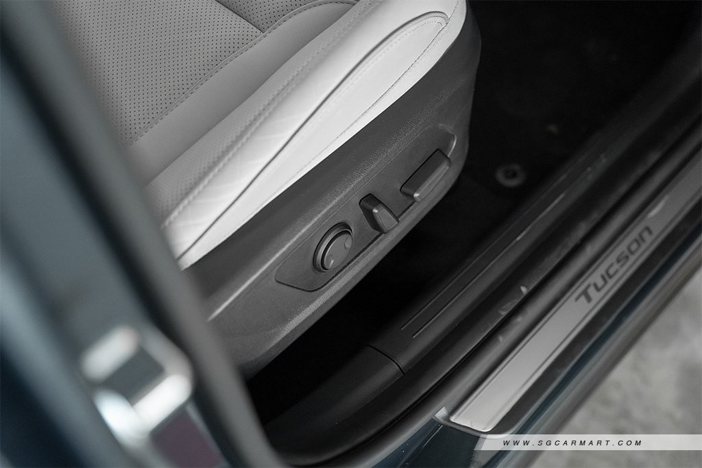 Hyundai Singapore TUCSON Hybrid driver seat adjustment controls and door scuff plate